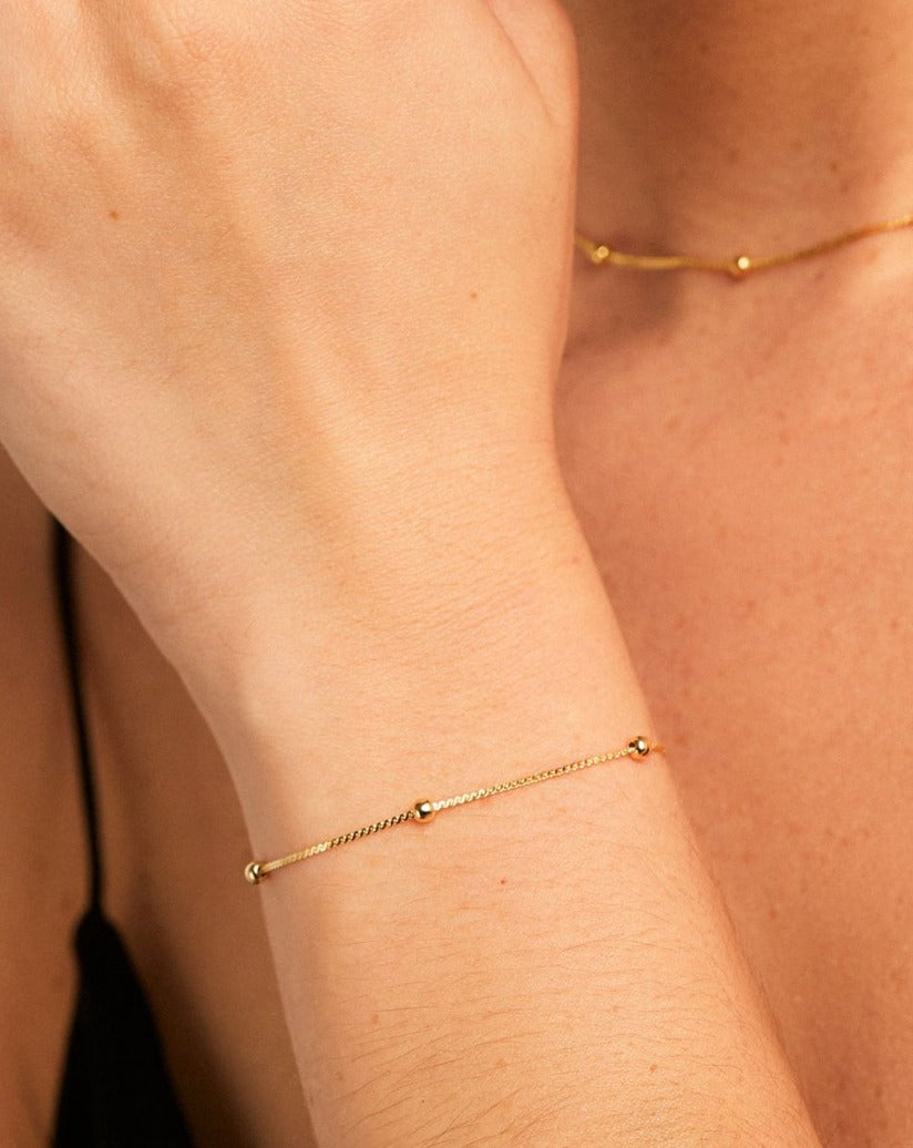 PULSERA SOLAR DORADO