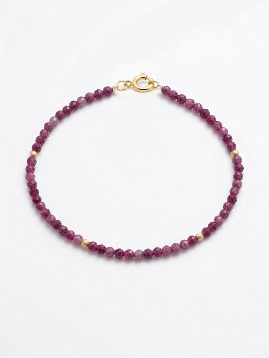 PULSERA RUBI 2.5MM CON BOLITAS ORO 18K
