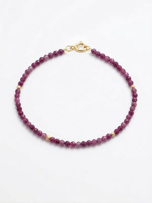 PULSERA RUBI 2.5MM CON BOLITAS ORO 18K