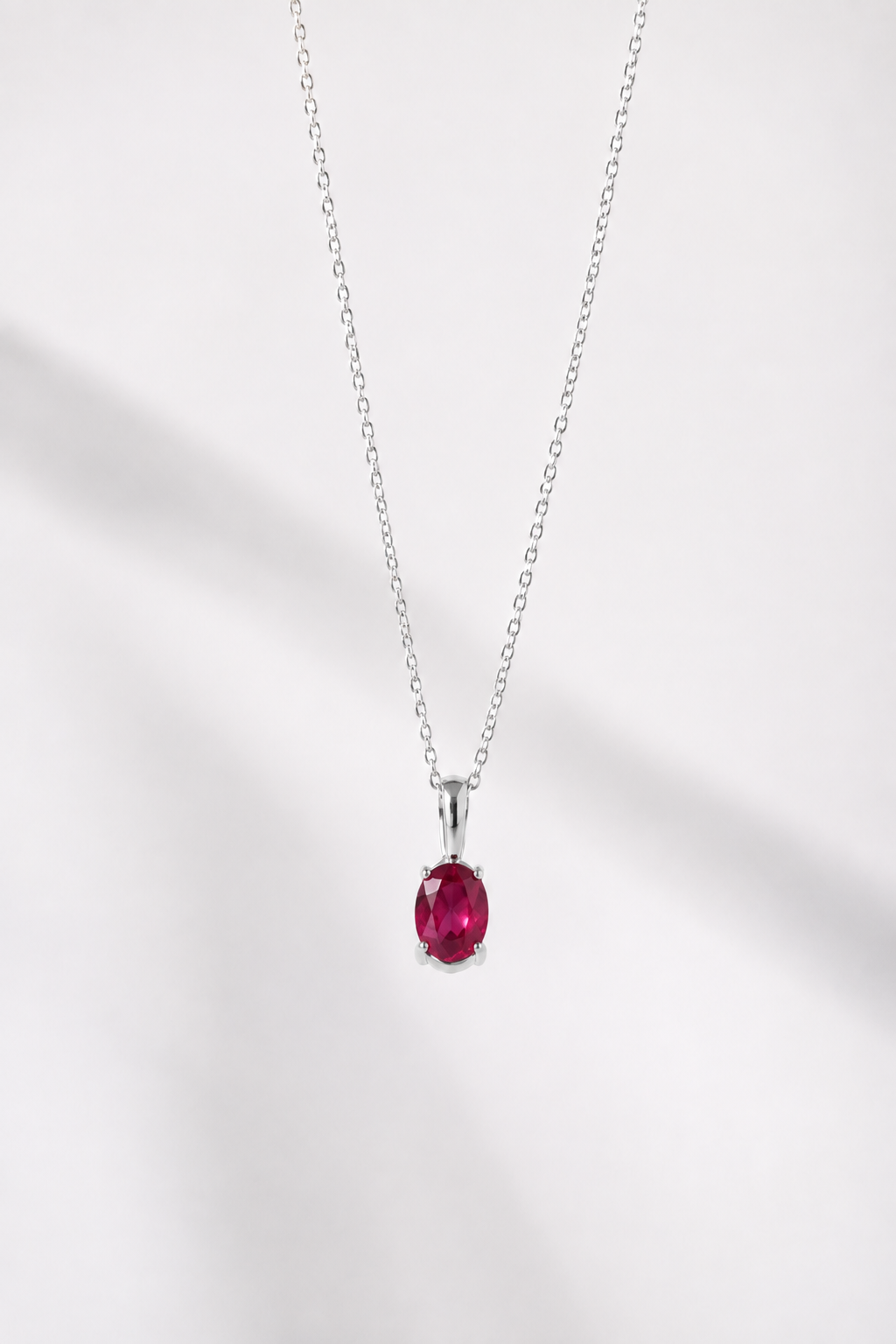 COLLAR OVAL RUBI 6X4MM PLATA