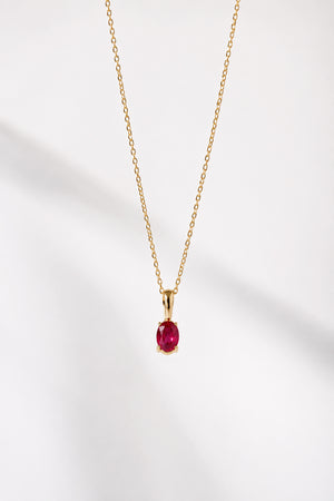 DIJE OVAL RUBI 6x4mm ORO 18K (A PEDIDO)