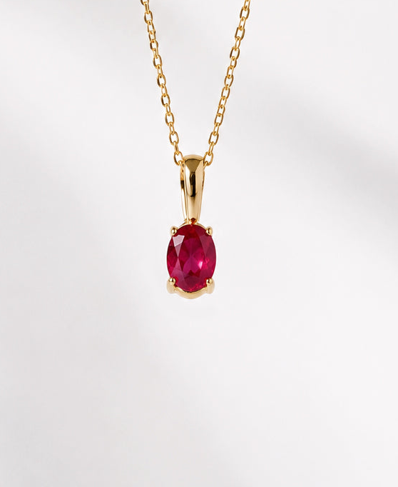 DIJE OVAL RUBI 6x4mm ORO 18K (A PEDIDO)